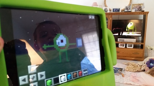 Playing Minecraft with Isaac. He is way better than me haha.